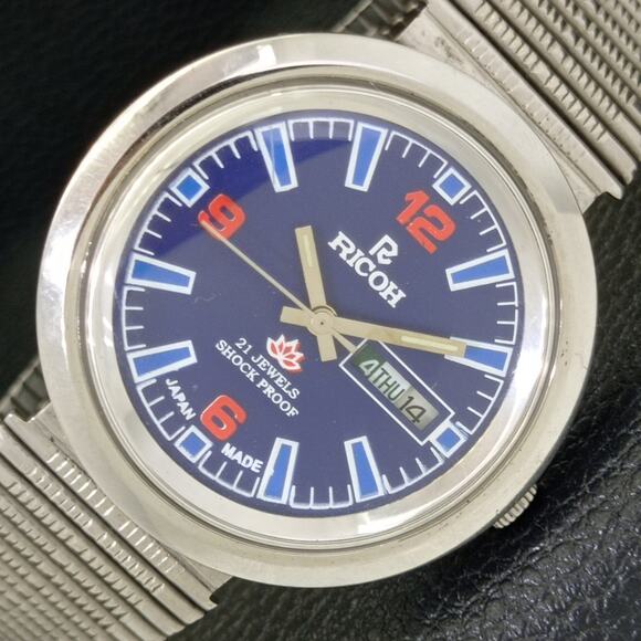 Seiko Other - Vintage 1980 Ricoh Automatic Mens Silver Watch W/daydate & Blue accents